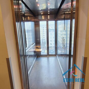 Prodej útulného bytu 1kk s lodžií, sklepem a garážovým stáním, Sluneční náměstí, Praha 13 Stodůlky